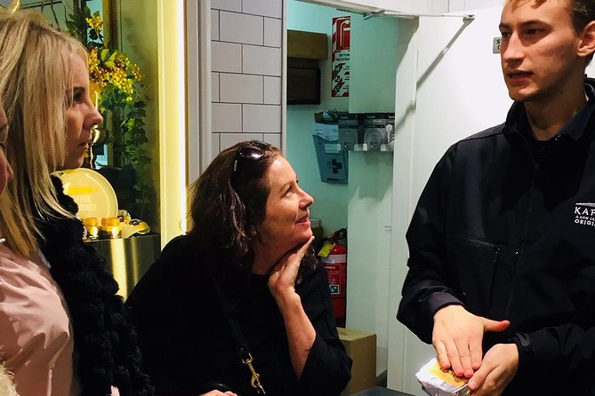 Auckland Food Walking Tour - Guides make the whole thing: Alex, Debbie, and Liz in action