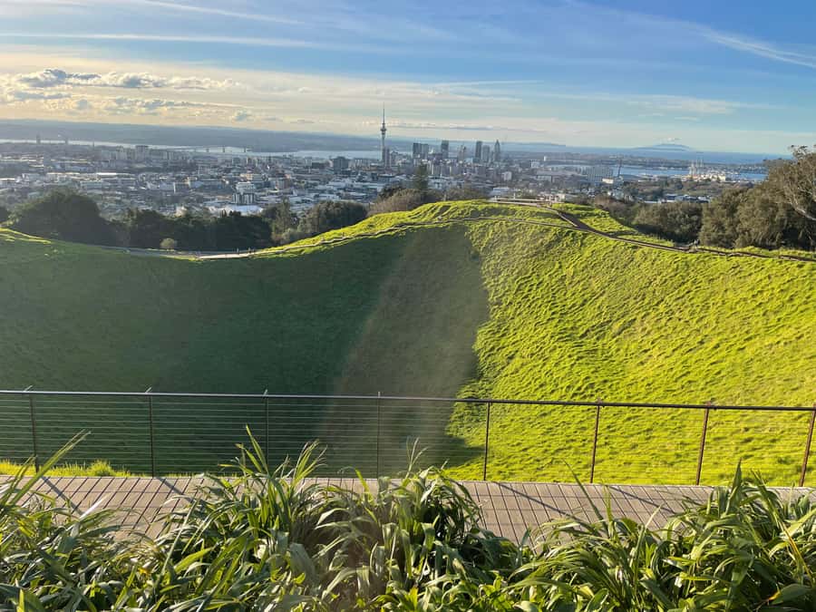 Auckland Half Day Tour Through Urban Wonders - Mission Bay Finish: Beach Time, Tamaki Drive Views, and Rangitoto Island