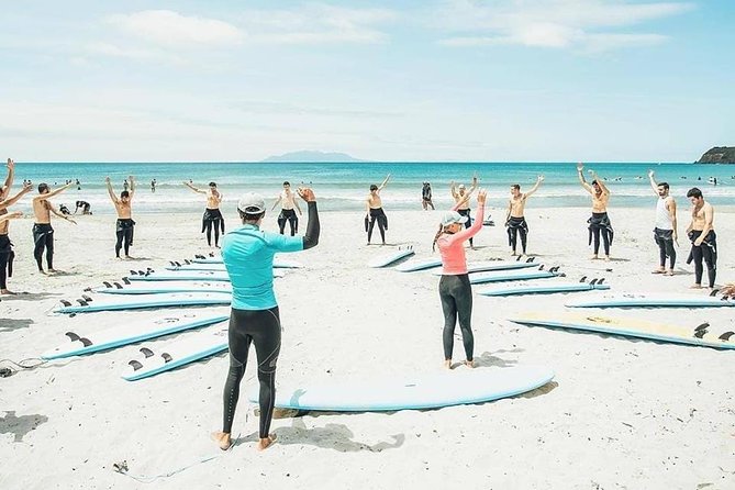 Beginner Surf Lesson at Te Arai Beach - Tide timing, group size, and why you get real coaching