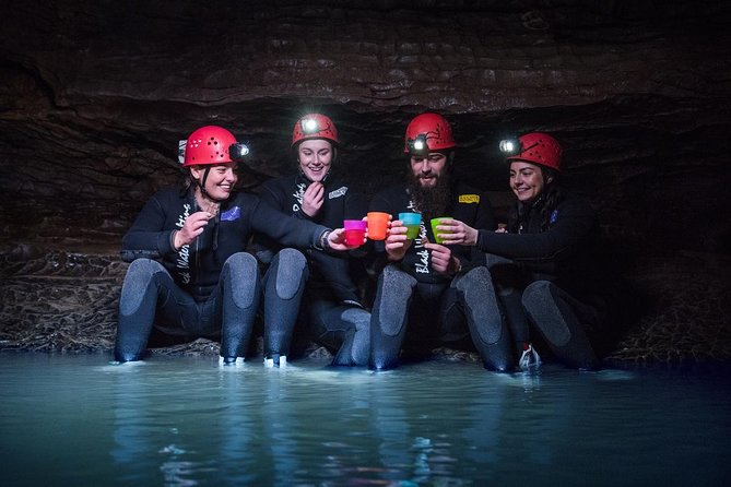 Black Abyss: Ultimate Waitomo Caving - Private Tour from Auckland - Inside the caves for 5 hours: abseiling, tubing, and the glowworm river vibe