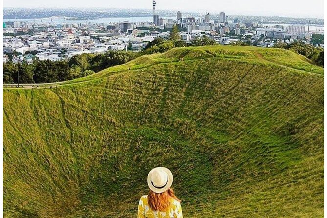Private Piha Beach, Rainforest Adventure & Mt. Eden with Guide - Piha Beach and Lion Rock: black sand drama and a shoreline you can’t fake
