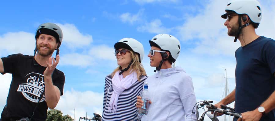 The Classic: Discover Amazing Auckland on an Electric Bike - E-bike setup and the headset system that keeps the group together
