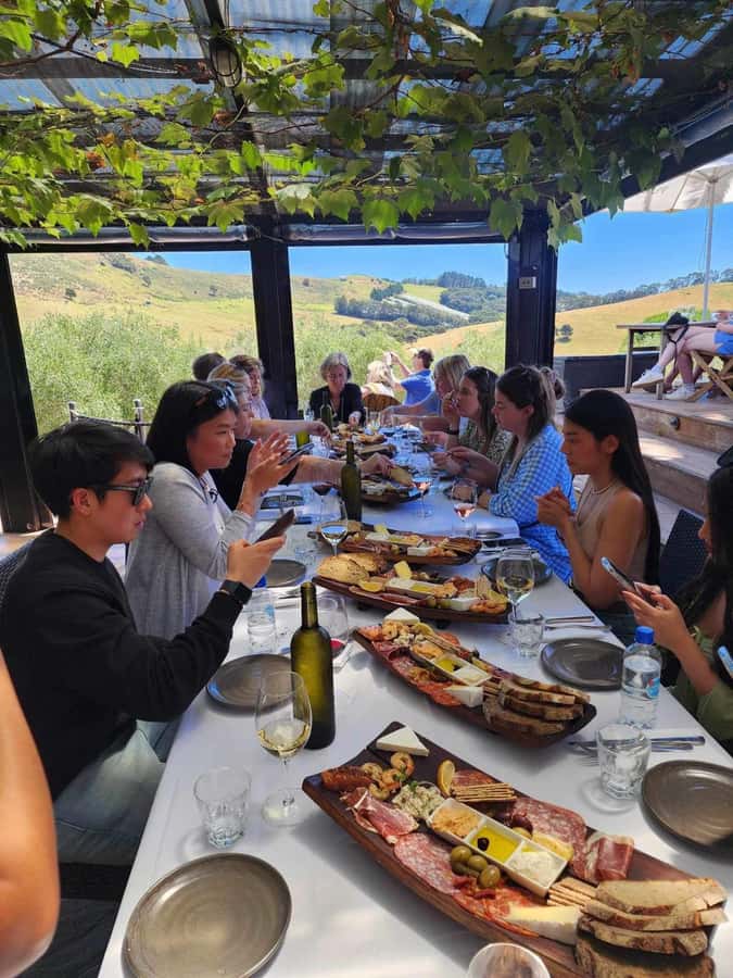 Waiheke: Scenic Taste and Graze Tour with Wine, Whisky, Beer - Stonyridge Vineyard lunch platters, plus a glass of wine with the view